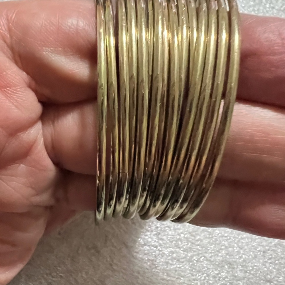 Beautiful gold tone group of bracelets